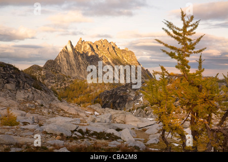 Sunset over the Upper Enchantment Lakes Basin with Prusik Peak and The Temple in the distance in the Alpine Lakes Wilderness. Stock Photo