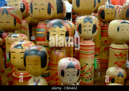 Traditional Japanese wooden toys, called 'Kokeshi', in the 'Oriental Bazaar' tourist souvenir shop in Omotesando,  Tokyo, Japan Stock Photo
