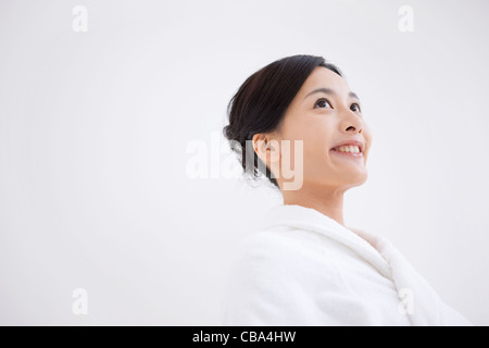 Woman in bathrobe Stock Photo