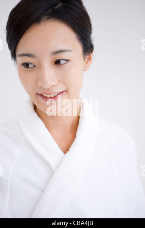 Woman in bathrobe Stock Photo
