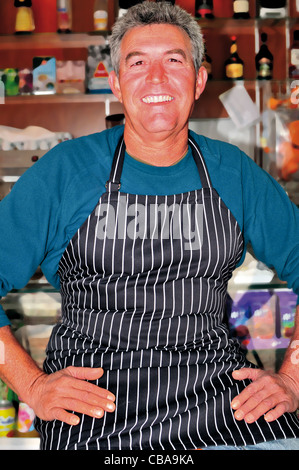 Portugal, Algarve: Mister José Joaquin Neto Pacheco in his bar "Cafetaria Finisterra" in Sagres Stock Photo