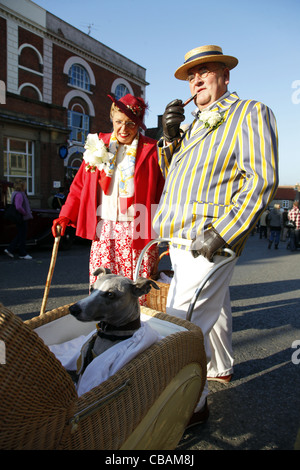 COUNTRY LADY & GENTLEMAN WITH WHIPPET IN PRAM PICKERING NORTH YORKSHIRE 15 October 2011 Stock Photo