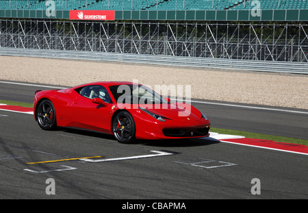 RED FERRARI 458 ITALIA CAR SILVERSTONE CIRCUIT ENGLAND 14 September 2011 Stock Photo