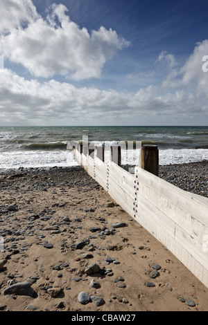 New groynes built as part of the sea defences on Tywyn beach Stock Photo