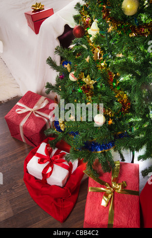 Four gifts with christmas tree in xmas Stock Photo