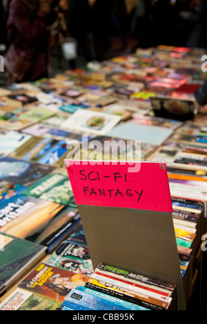 Sci-fi and fantasy books on display at the Southbank book market, London, UK Stock Photo