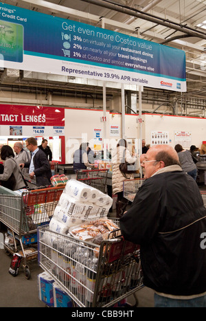 People at the checkout tills, Costco discount warehouse store , Lakeside UK Stock Photo