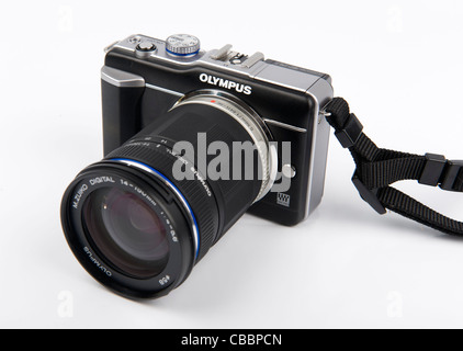 Olympus E-PL1 digital camera with 14-150mm f4-5.6 lens cutout on white background Stock Photo