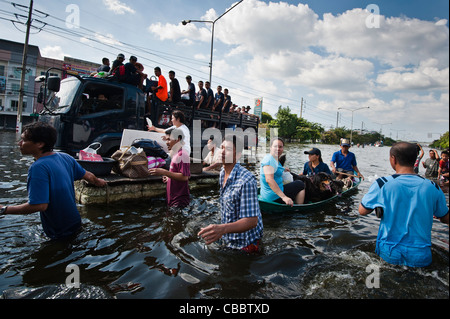 People being evacuated during flood in Thailand 2011. Stock Photo