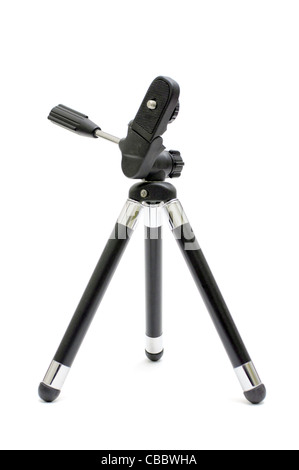 Small camera tripod made of plastic and metal over a white background Stock Photo