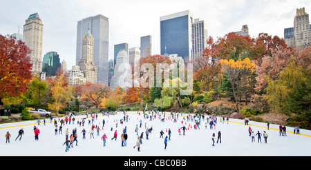 Ice skaters having fun in New York Central Park in fall Stock Photo