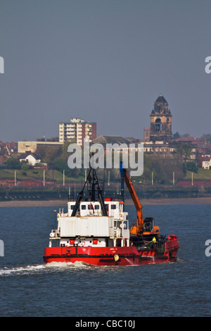 Small dredger 'ADMIRAL DAY' in river Mersey working on site of new Liverpool ferry terminal, Merseyside, England UK. April 2011 Stock Photo