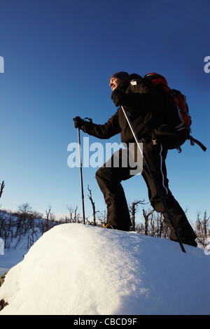 Back View Of Skier Ascending On A Ski Tow Stock Photo - Alamy