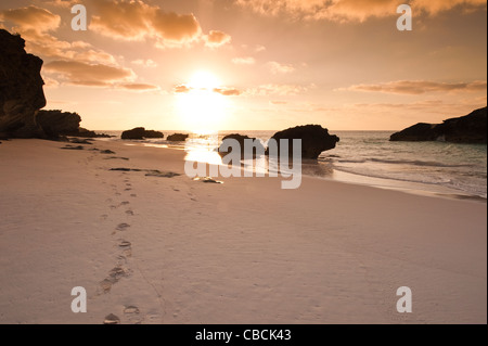 Bermuda. Sunrise and footprints footsteps on Horseshoe Bay beach, Bermuda. Stock Photo