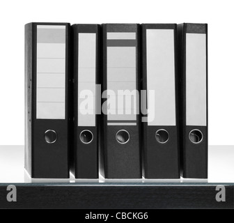 some Folders on desk surface in white back Stock Photo