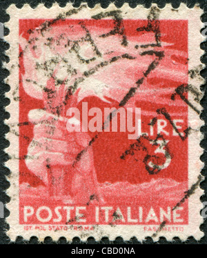 ITALY - CIRCA 1945: A stamp printed in Italy, shows a Torch, circa 1945 Stock Photo