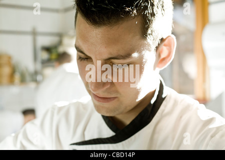 Chef in kitchen, portrait Stock Photo