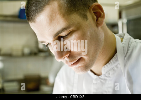 Chef working in kitchen, portrait Stock Photo