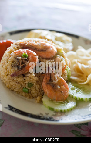 Shrimp fried rice with cucumber slices Stock Photo
