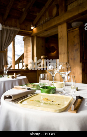 Nicely set tables in resort dining room Stock Photo