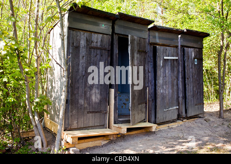 A row of primitive outdoor toilets without running water, latrine, WC. (CTK Photo/Rene Fluger) Stock Photo