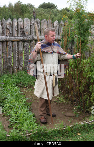 Celtic characters at the reconstruction of the Iron age dwelling at the Navan centre and fort near Armagh  in Northern Ireland. Stock Photo