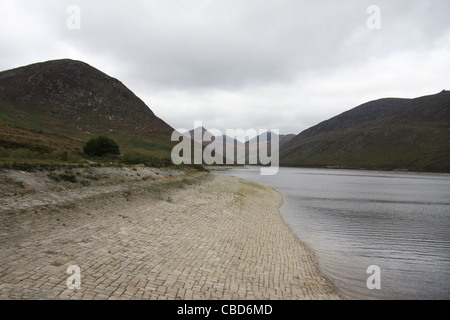 The Silent Valley Reservoir is a reservoir located in the Mourne Mountains near Kilkeel, County Down in Northern Ireland. Stock Photo