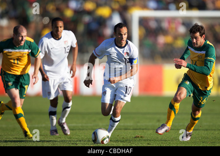 Landon Donovan of the USA drives the ball during an international soccer friendly against Australia ahead of the 2010 World Cup. Stock Photo