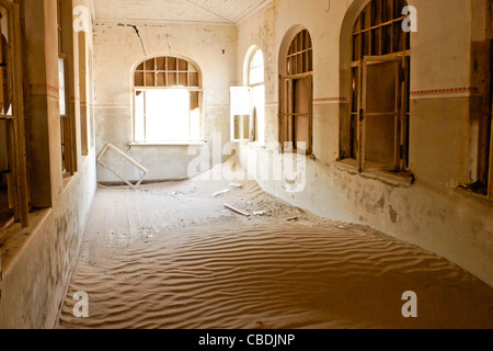 Old building in abandoned diamond mining town of Kolmanskop, Namibia Stock Photo