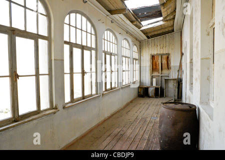 Old building in abandoned diamond mining town of Kolmanskop, Namibia Stock Photo