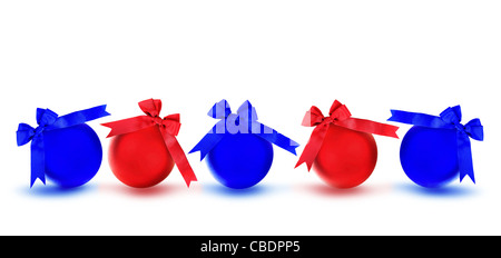 Red and blue baubles with bows, Christmas tree ornaments and holiday decorations isolated on white background Stock Photo