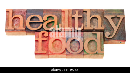 healthy food phrase in vintage wood letterpress printing blocks, isolated on white Stock Photo