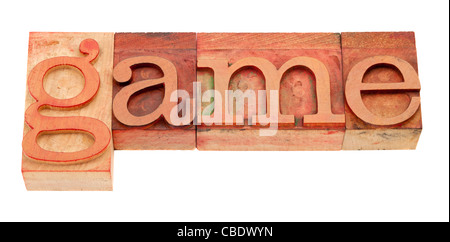 game - isolated word in vintage wood letterpress printing blocks stained by red inks Stock Photo