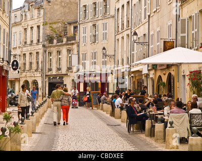 People walking and eating in restaurants in a pedestrian street of La Rochelle, France, Europe Stock Photo