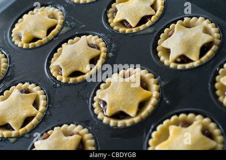 A batch of homemade mince pies ready for baking in an oven Stock Photo