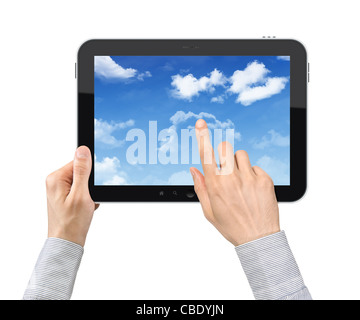 Businessman hands are holding and point on contemporary tablet pc with cloudscape on screen. Concept on cloud-computing theme. Stock Photo