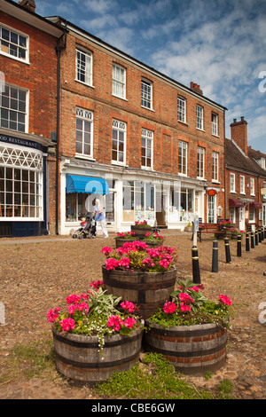 UK, England, Bedfordshire, Woburn, The Pitchings, floral planters in old market place Stock Photo