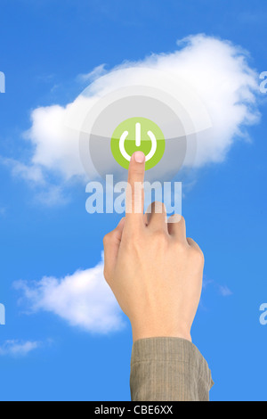 touching start on green button on cloud Stock Photo