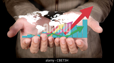 human hand showing a arrows graph investment Stock Photo