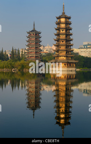 Sun and Moon multi-level Pagodas on Shanhu or Fir Lake in early morning Guilin China Stock Photo