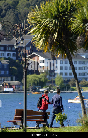Couple walking at Lake Llanquihue. Puerto Varas, Lake's District, Chile Stock Photo
