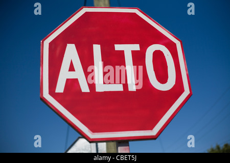 A STOP or ALTO sign in Monterrey, Mexico. Stock Photo