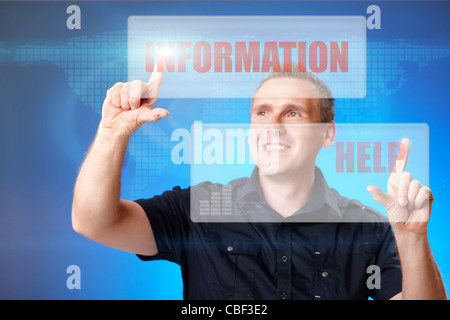 Man using holographic interface, pressing white and red buttons with words information and help Stock Photo