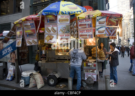 Hot dog vendor on 5th Avenue in NYC. Stock Photo