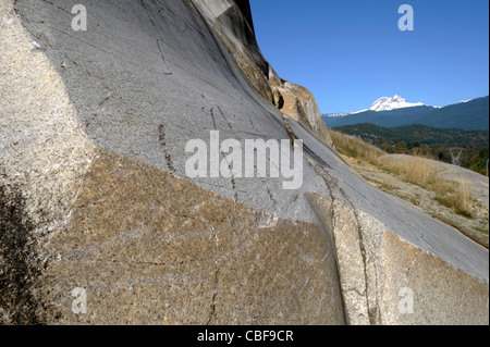 The rock of granite w Mt. Garibaldi in the background Stock Photo