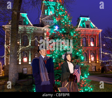 CAMBRIDGE, OHIO - NOVEMBER 24: Christmas lighting on the old Court House building in Cambridge Ohio on November 24, 2011. This annual event uses Dickens characters on the main street. Stock Photo