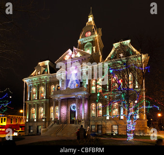 CAMBRIDGE, OHIO - NOVEMBER 24: Christmas lighting on the old Court House building in Cambridge Ohio on November 24, 2011. This annual event uses Dickens characters on the main street. Stock Photo