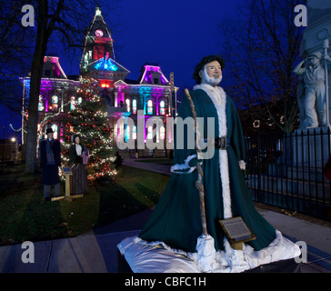 CAMBRIDGE, OHIO - NOVEMBER 24: Christmas lighting on the old Court House building in Cambridge Ohio on November 24, 2011. This annual event uses Dickens characters on the main street. Stock Photo