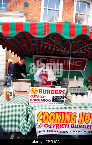 Louth Victorian Market,  Lincolnshire, England man selling ostrich burgers and kangaroo Stock Photo