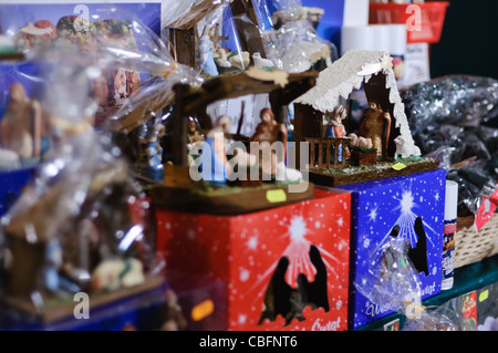 Handmade nativity scenes on sale at the Christmas market in Rynek Glowny, Krakow, Poland Stock Photo